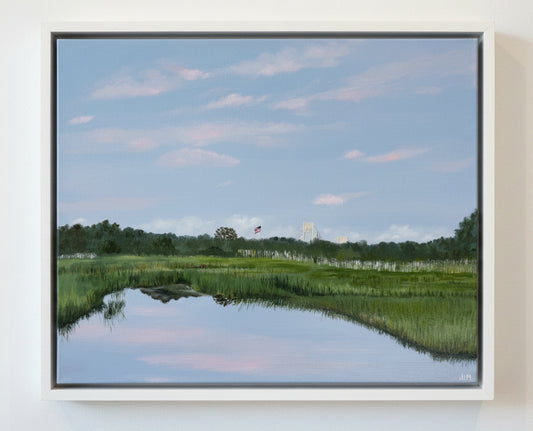Framed painting of a landscape with a pond and sky reflection.