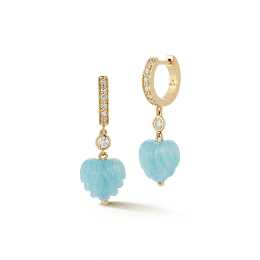 Gold hoop earrings with turquoise heart-shaped drops on a white background